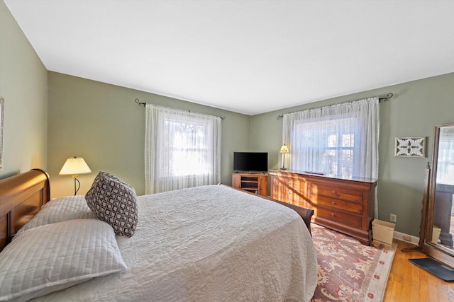 bedroom featuring light wood-type flooring