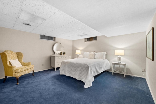 bedroom featuring dark colored carpet