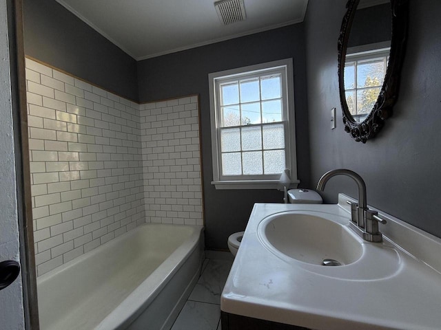 full bathroom with tile patterned floors, vanity, toilet, and tiled shower / bath