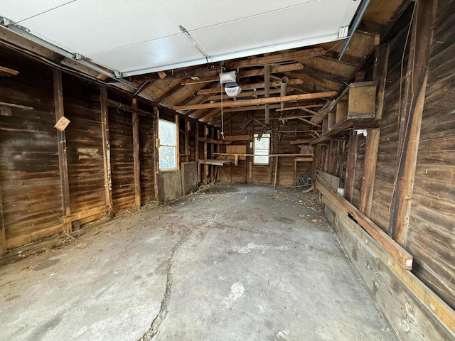 interior space featuring a healthy amount of sunlight and vaulted ceiling