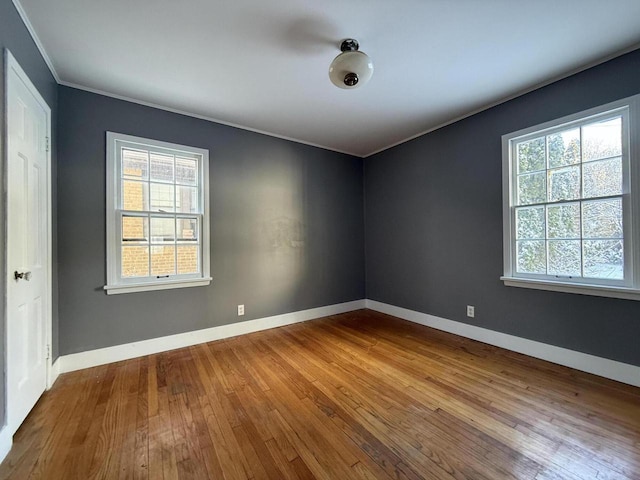 spare room featuring hardwood / wood-style floors