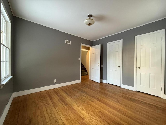 unfurnished bedroom featuring light hardwood / wood-style flooring