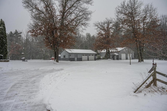 view of yard layered in snow