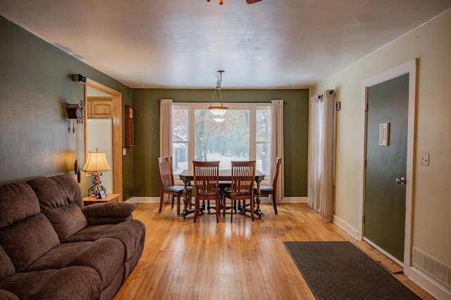 dining space featuring light hardwood / wood-style flooring