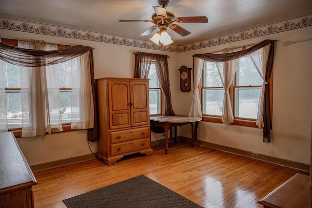 sitting room featuring ceiling fan and light hardwood / wood-style floors