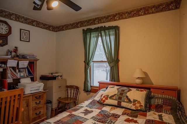 bedroom featuring ceiling fan and multiple windows