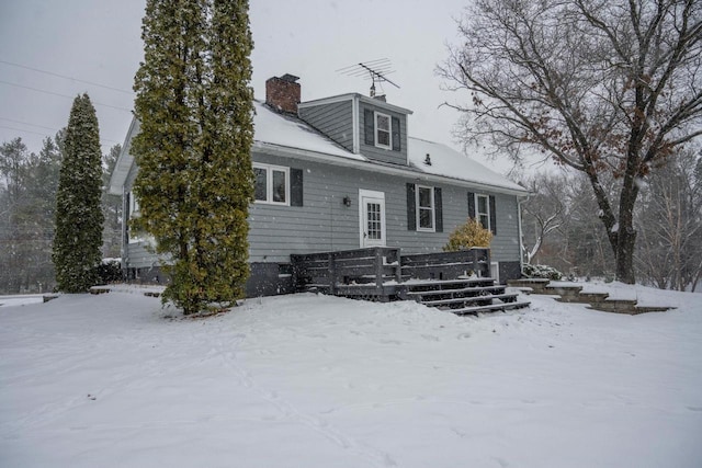 view of snow covered property