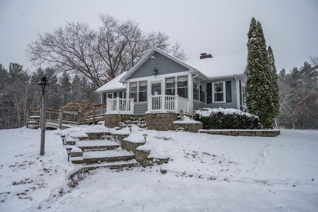 view of front facade featuring a sunroom