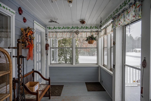 sunroom with wooden ceiling