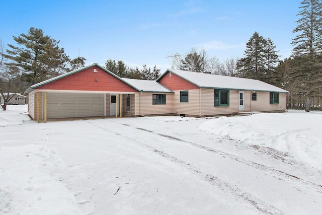 single story home with a garage