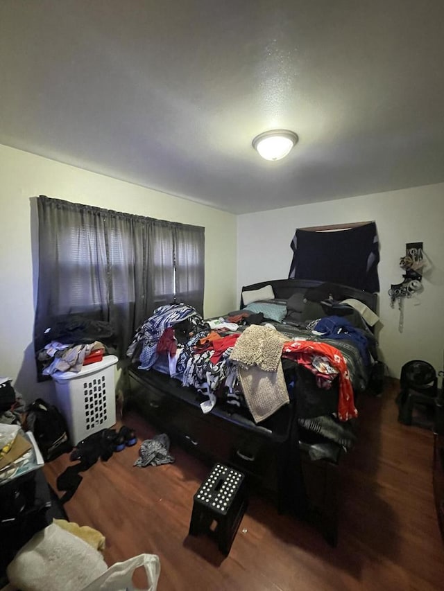 bedroom featuring hardwood / wood-style floors