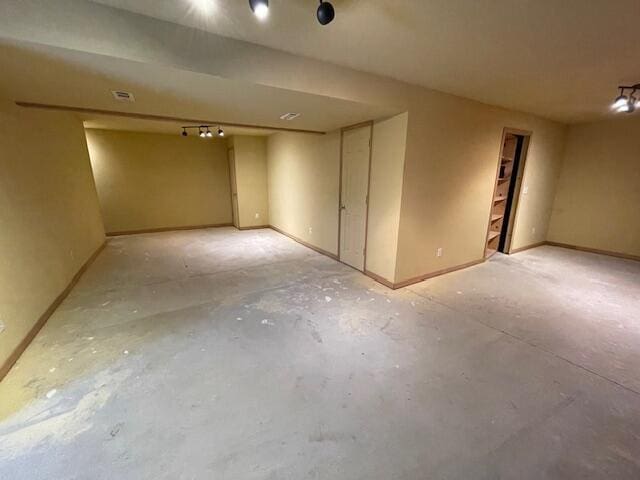 basement with track lighting