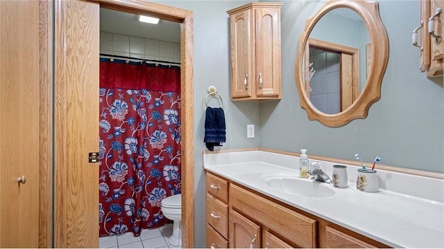 bathroom featuring tile patterned floors, vanity, toilet, and a shower with curtain