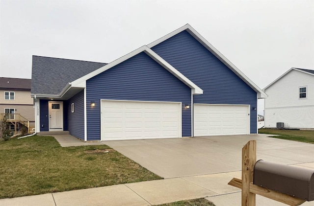 single story home with a front lawn and a garage