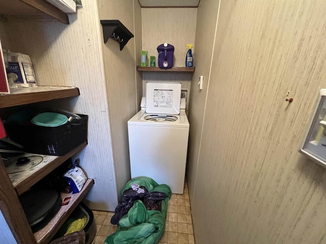 washroom with washer / dryer