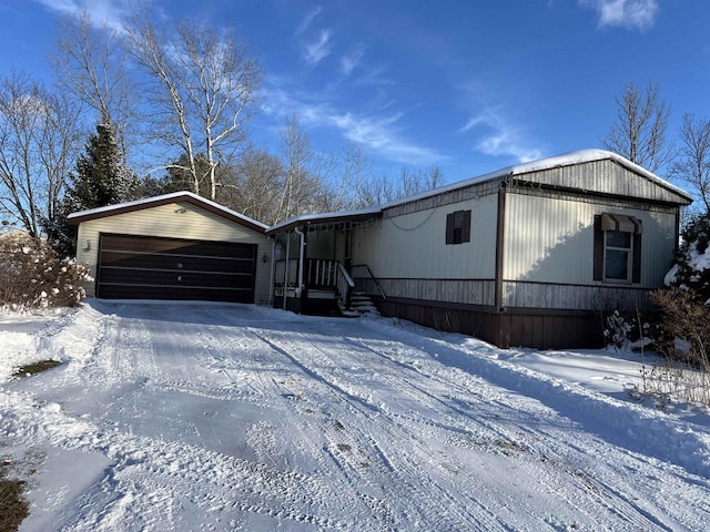 view of front of home with a garage