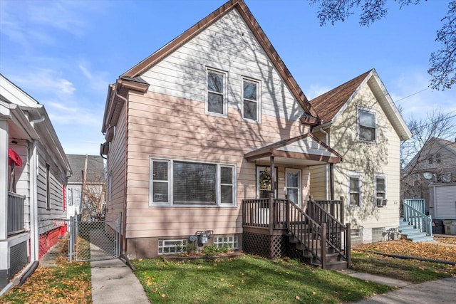 front facade featuring a front yard