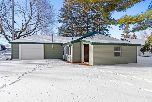 exterior space with a garage