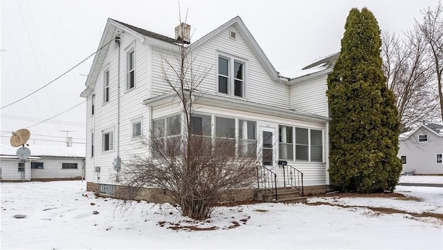 view of snow covered property