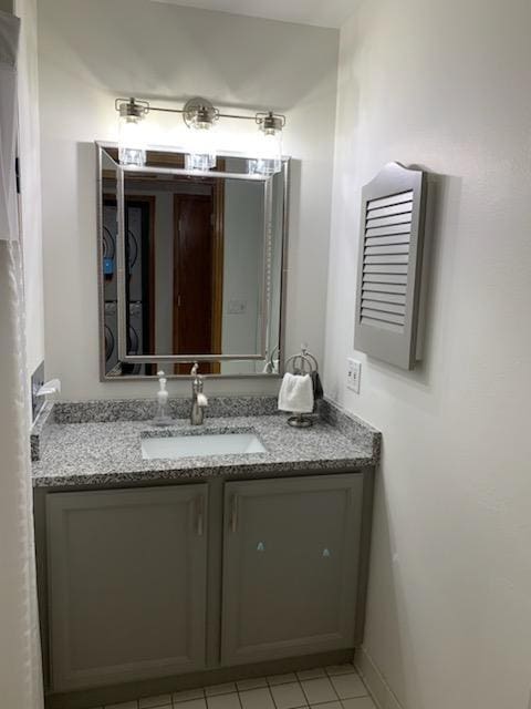 bathroom with vanity and tile patterned floors