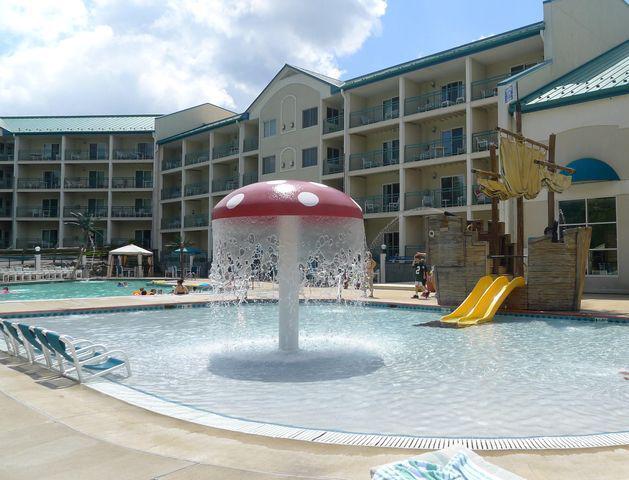 view of pool featuring pool water feature