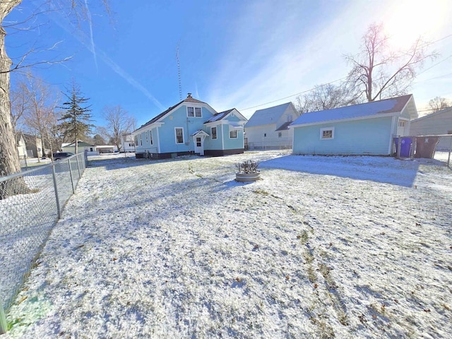 view of snow covered property