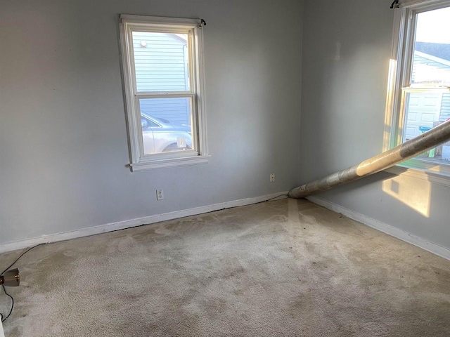 spare room with carpet flooring