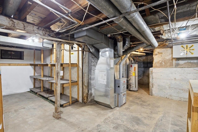 basement featuring heating unit and water heater