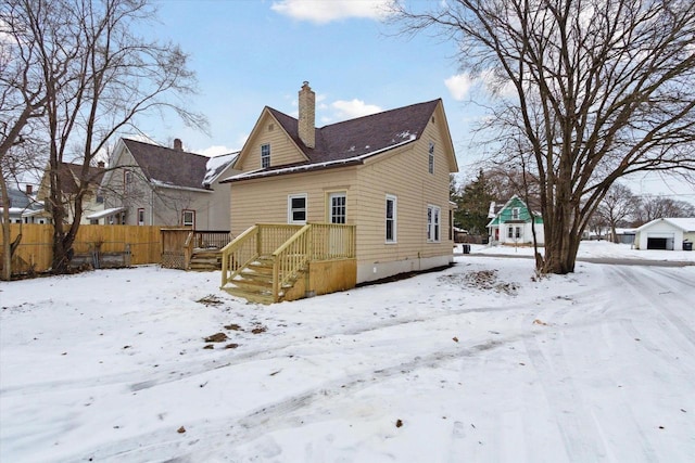 view of snow covered property