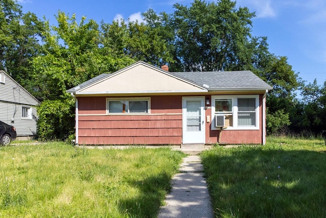 bungalow with a front lawn