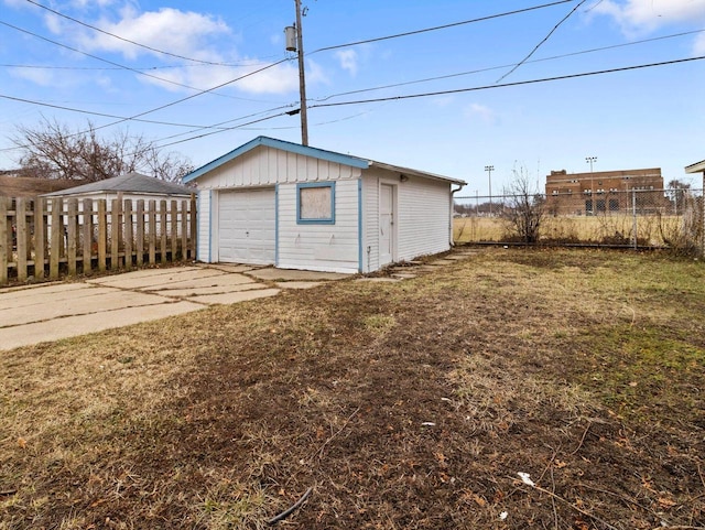 garage with a lawn