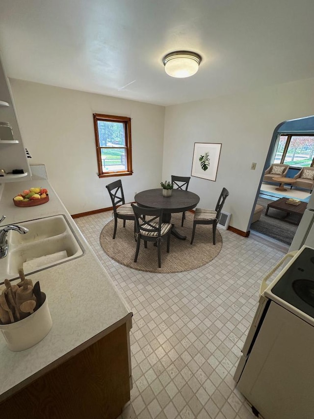 dining area featuring sink