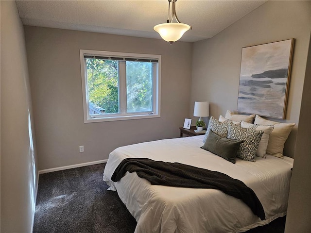 bedroom featuring carpet flooring and lofted ceiling