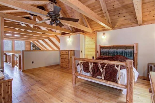 bedroom with hardwood / wood-style floors, lofted ceiling with beams, ceiling fan, and wooden ceiling