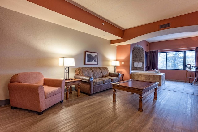 living room with hardwood / wood-style flooring