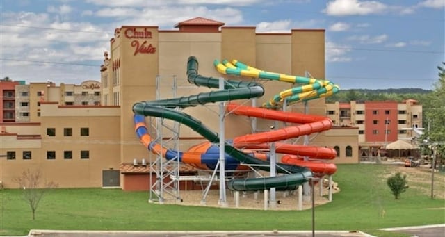 view of playground featuring a yard