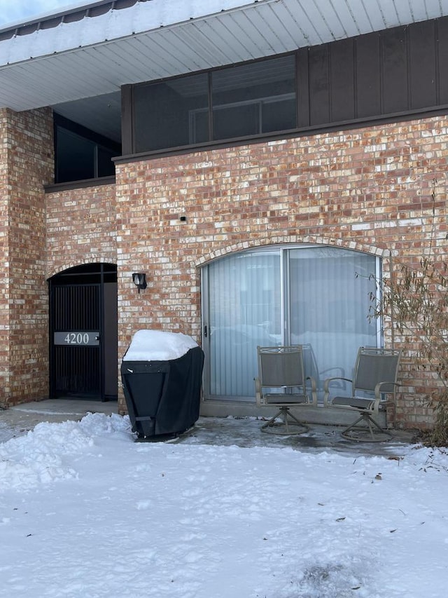 view of snow covered patio