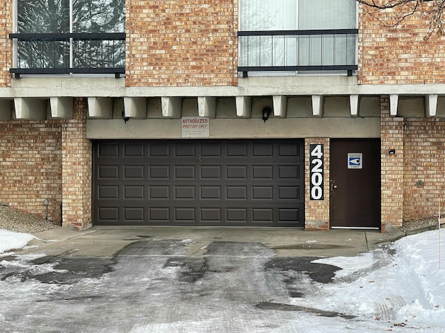 view of snow covered garage