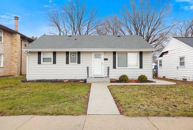 view of front of home featuring a front yard