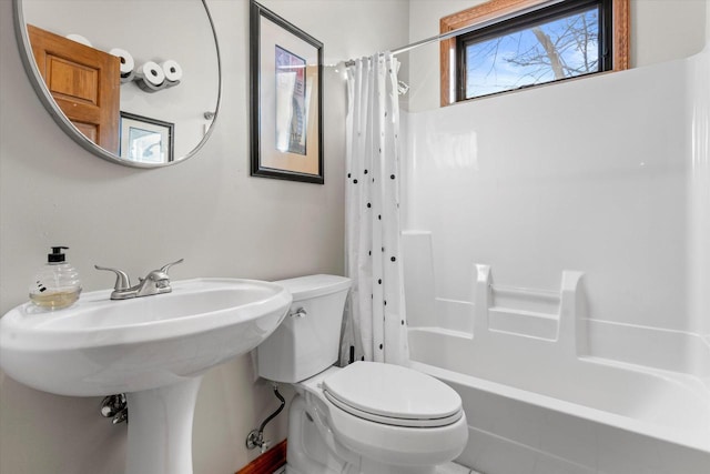 6461 Blue Heron Pointe Dr, Waterford, WI 53185 - bathroom featuring shower / tub combo and toilet
