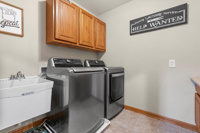 6461 Blue Heron Pointe Dr, Waterford, WI 53185 - laundry room with washer and dryer, sink, and cabinets