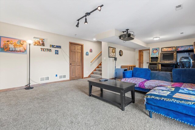6461 Blue Heron Pointe Dr, Waterford, WI 53185 - living room featuring carpet floors and rail lighting