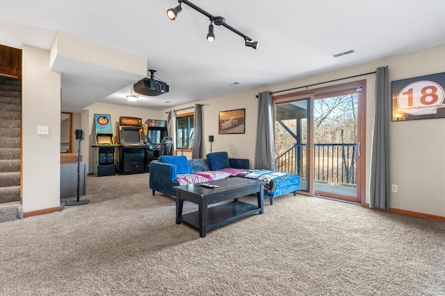 6461 Blue Heron Pointe Dr, Waterford, WI 53185 - carpeted living room with track lighting