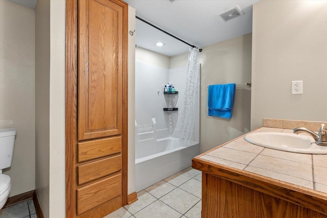 6461 Blue Heron Pointe Dr, Waterford, WI 53185 - full bathroom with tile patterned flooring, vanity, toilet, and shower / bath combo with shower curtain