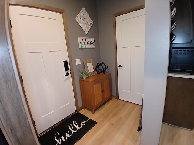 foyer with light hardwood / wood-style flooring