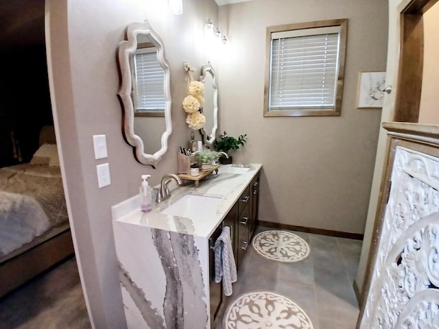 bathroom with vanity and tile patterned floors