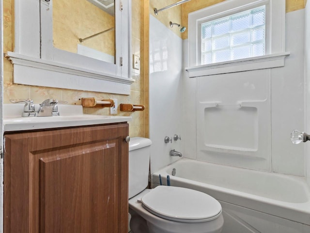 full bathroom featuring decorative backsplash, vanity, toilet, and shower / bathtub combination