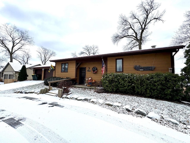 single story home with a garage