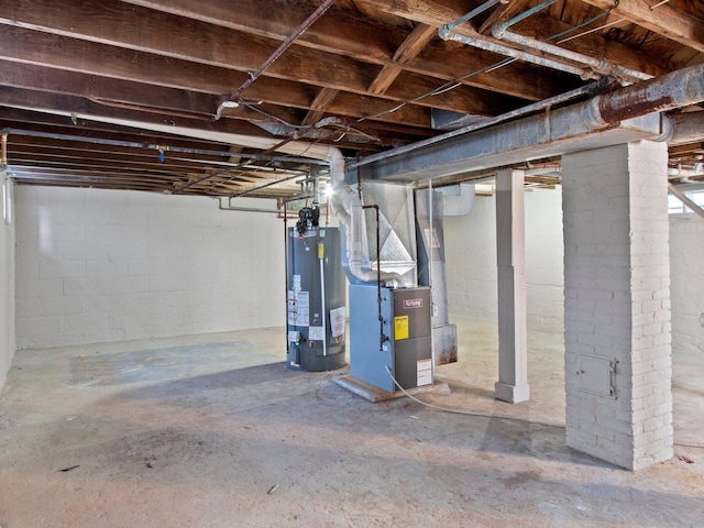 basement with heating unit and water heater