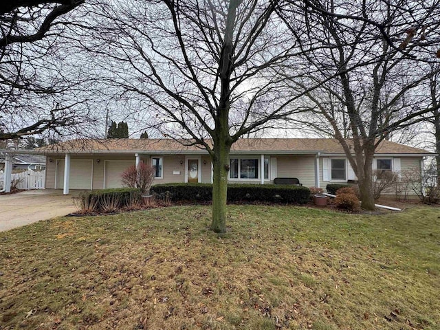 ranch-style house with a front lawn and a garage